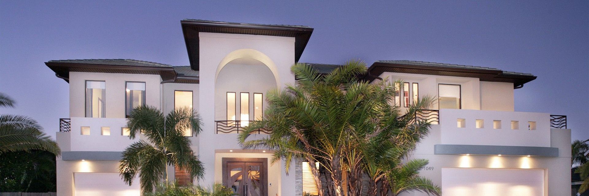 Completed Addition Building and Design custom home with tile roof and deep protective overhangs.