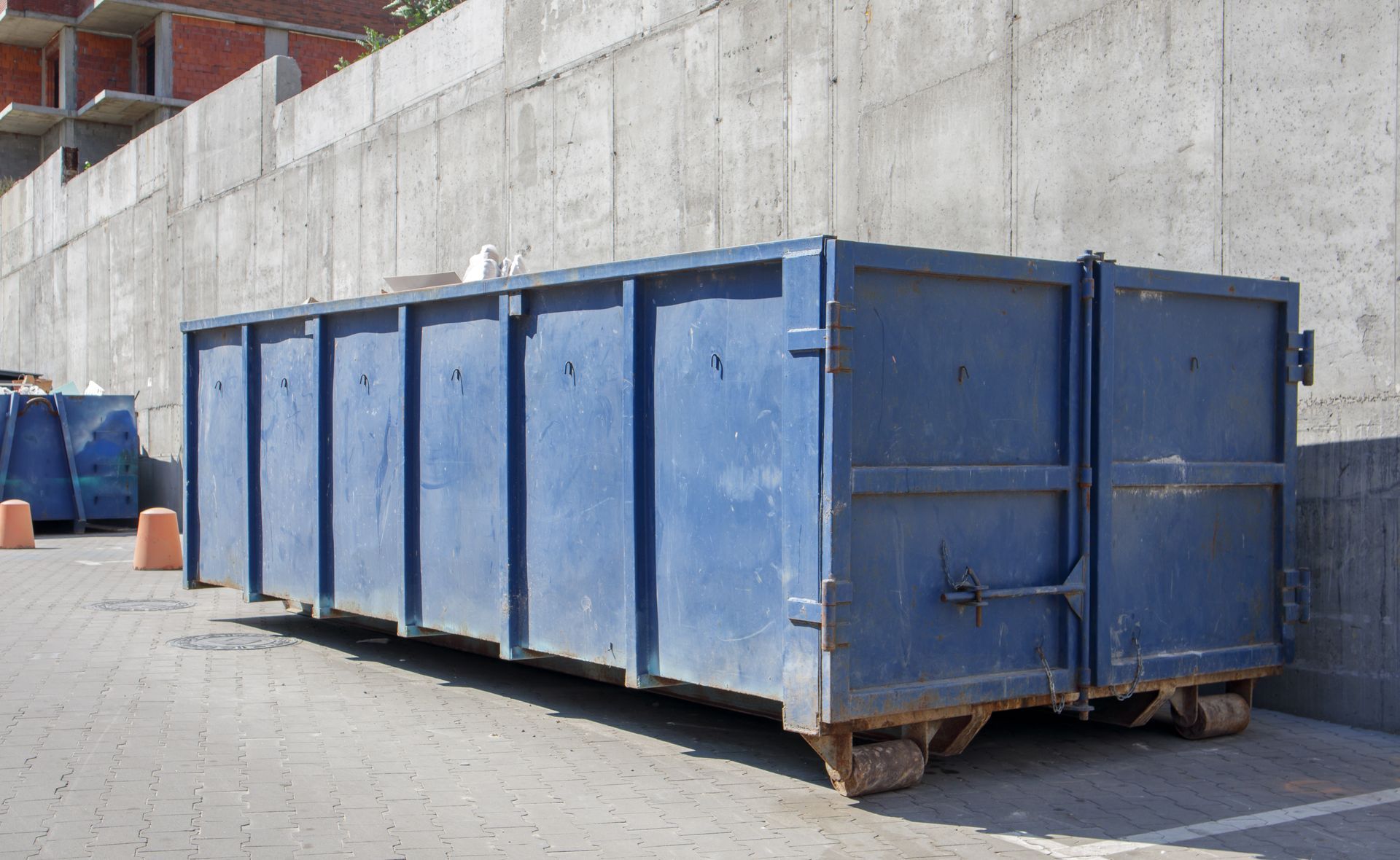 Dumpster in Parking Lot