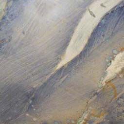 Abstract gray-blue textured brushstrokes with white highlights and beige accents