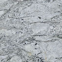 Light gray marble surface with dark veining and speckled texture