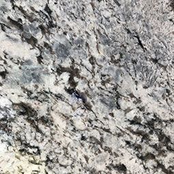 Close-up of gray and white speckled granite with dark veining