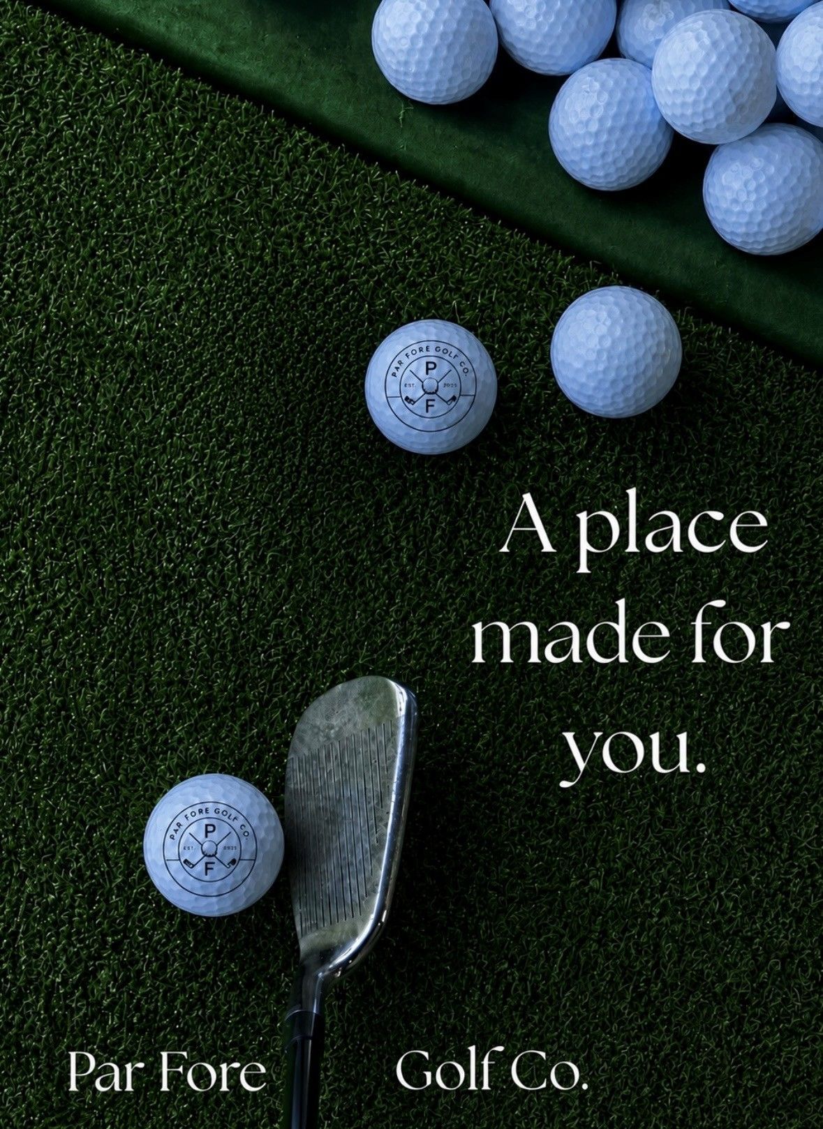 White golf balls scattered on green grass.