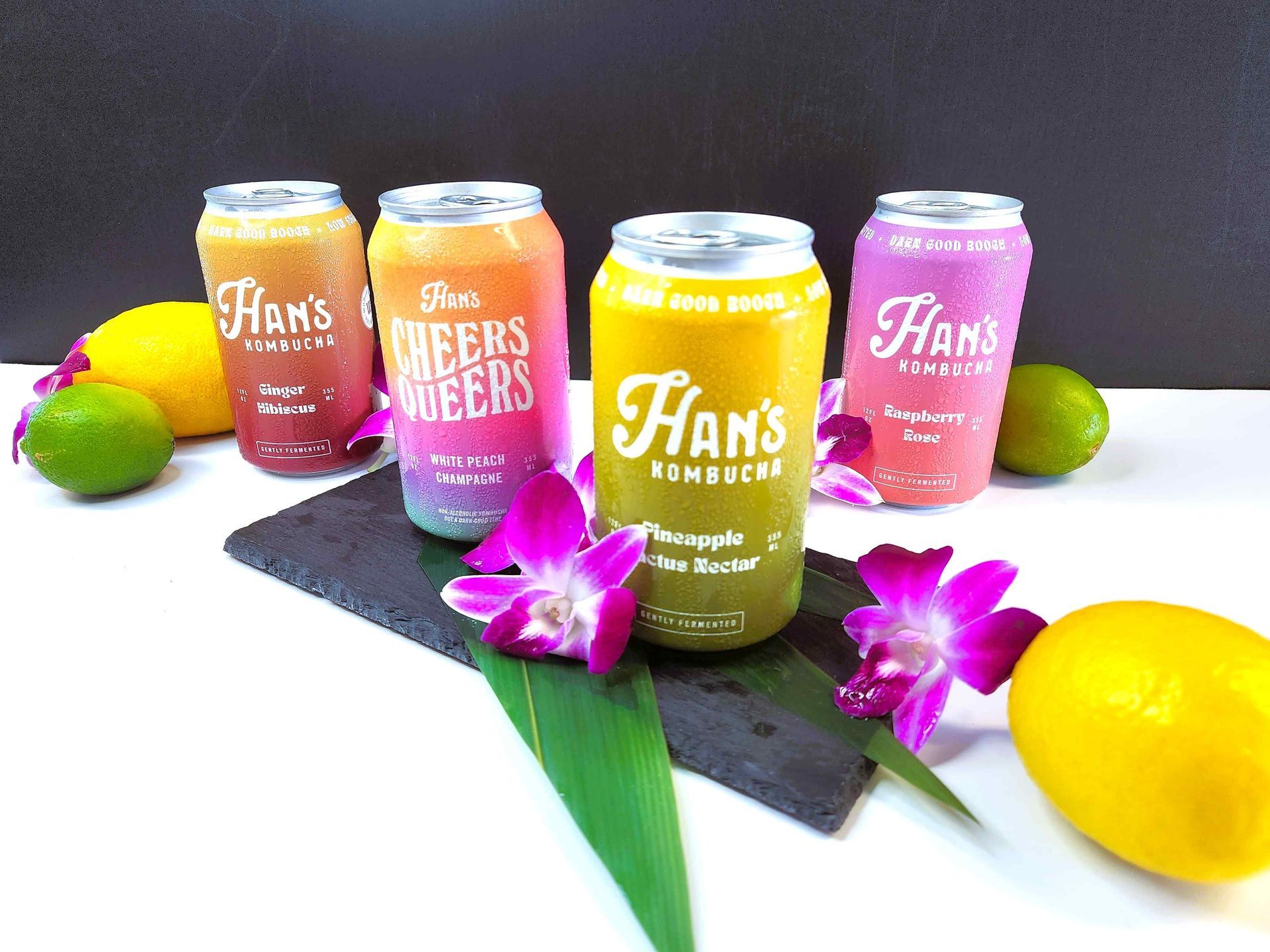Four cans of ham 's kombucha are sitting on a table