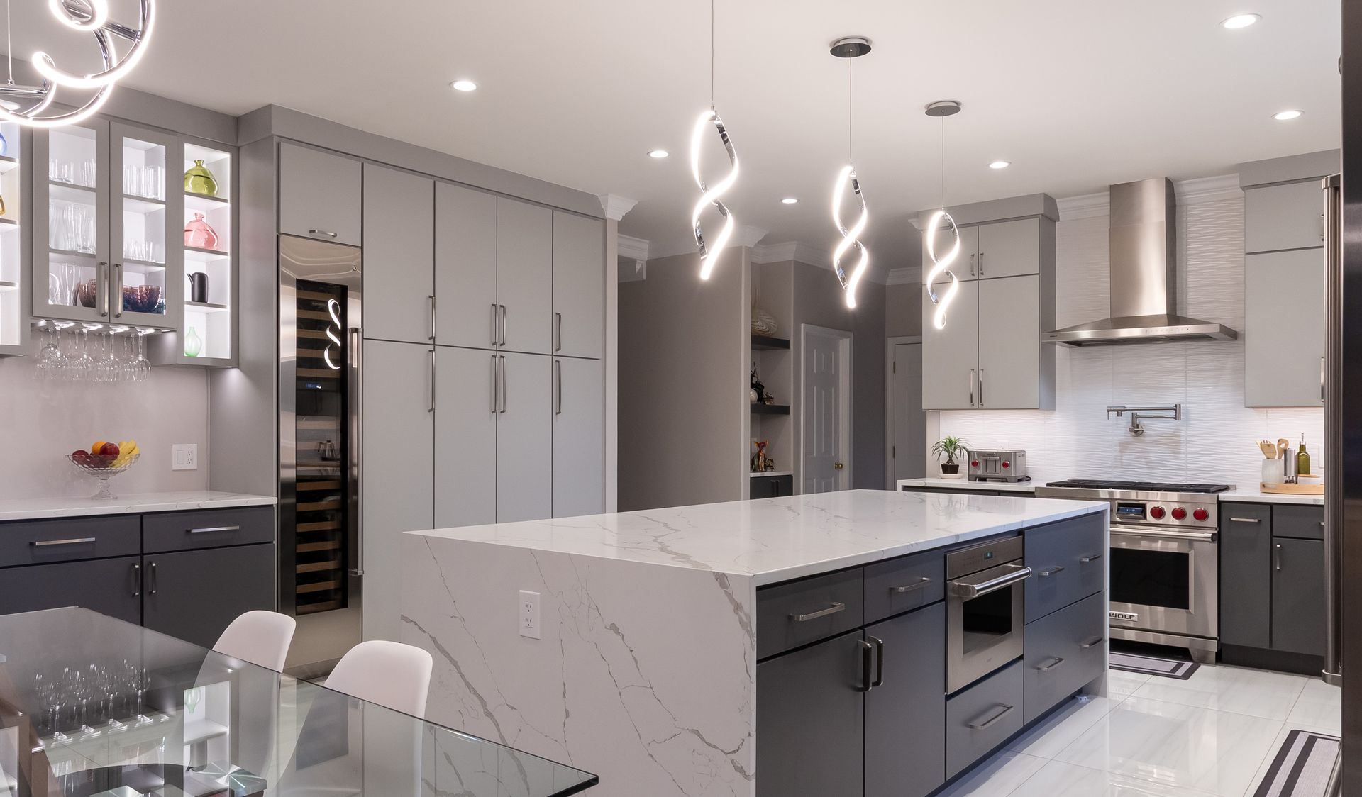 There is a large island in the middle of the kitchen.