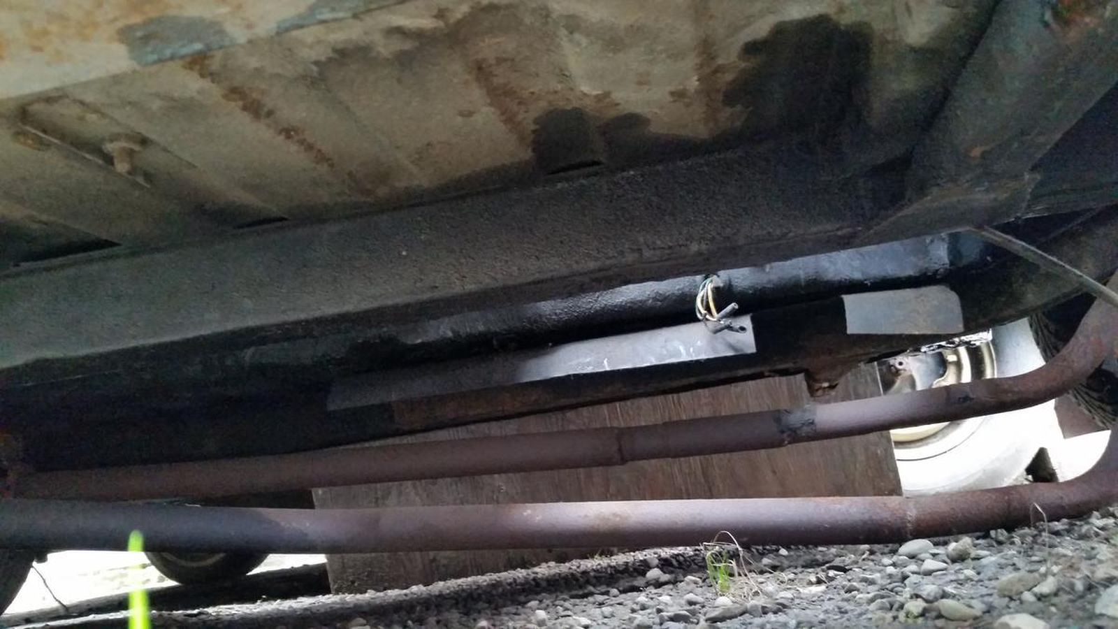 A close up of the underside of a car.
