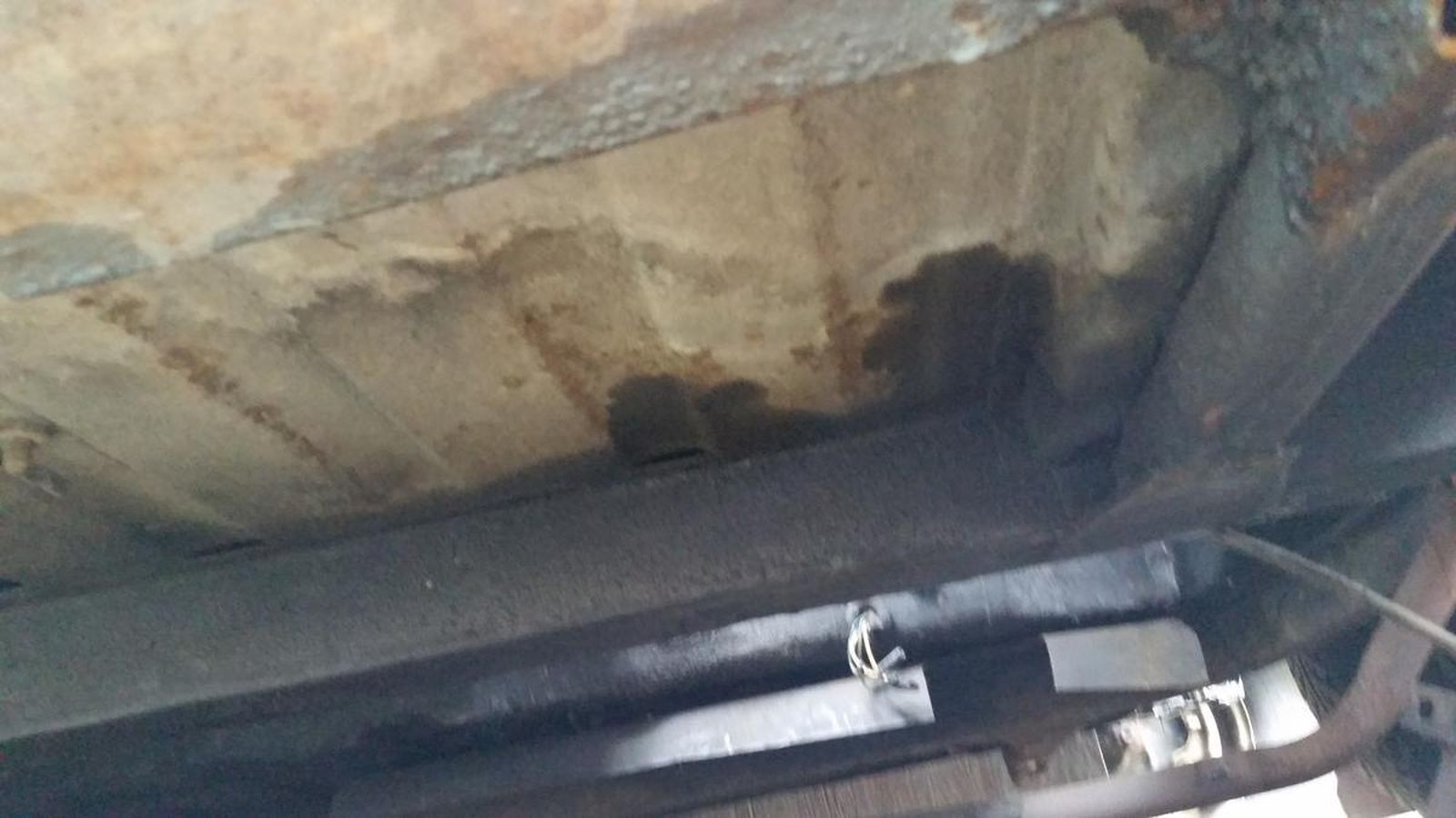 A close up of the underside of a car.