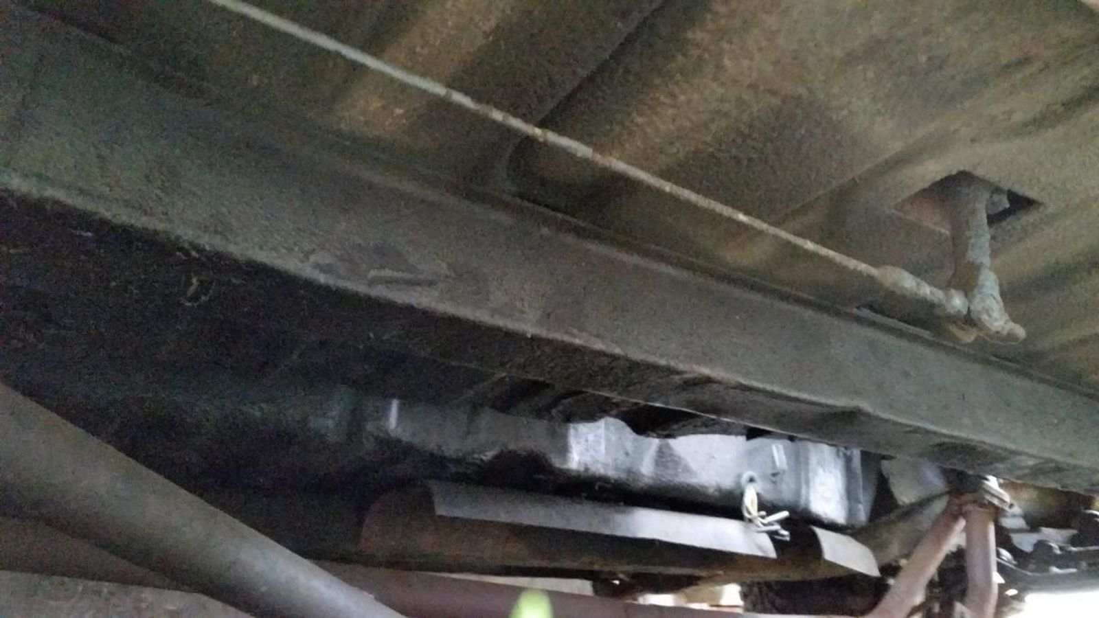 A close up of the underside of a car.