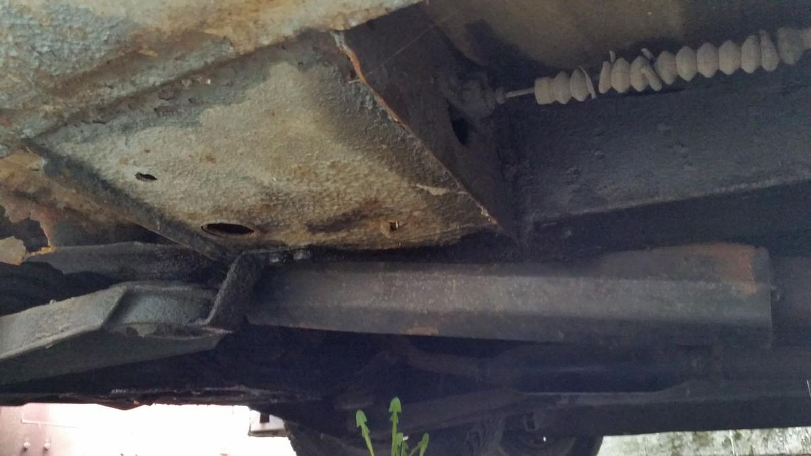 A close up of the underside of a car.
