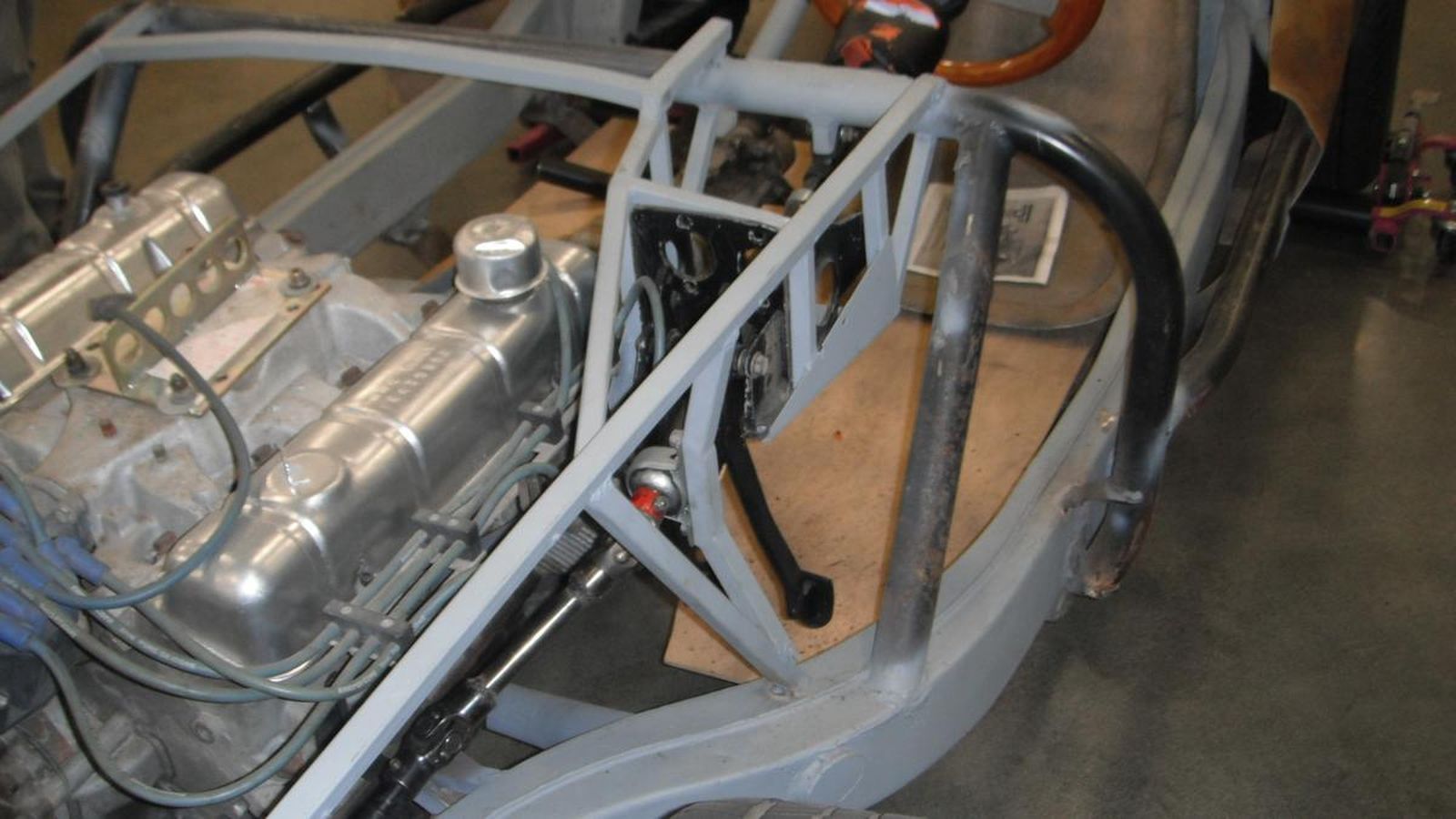 A close up of a car engine in a frame