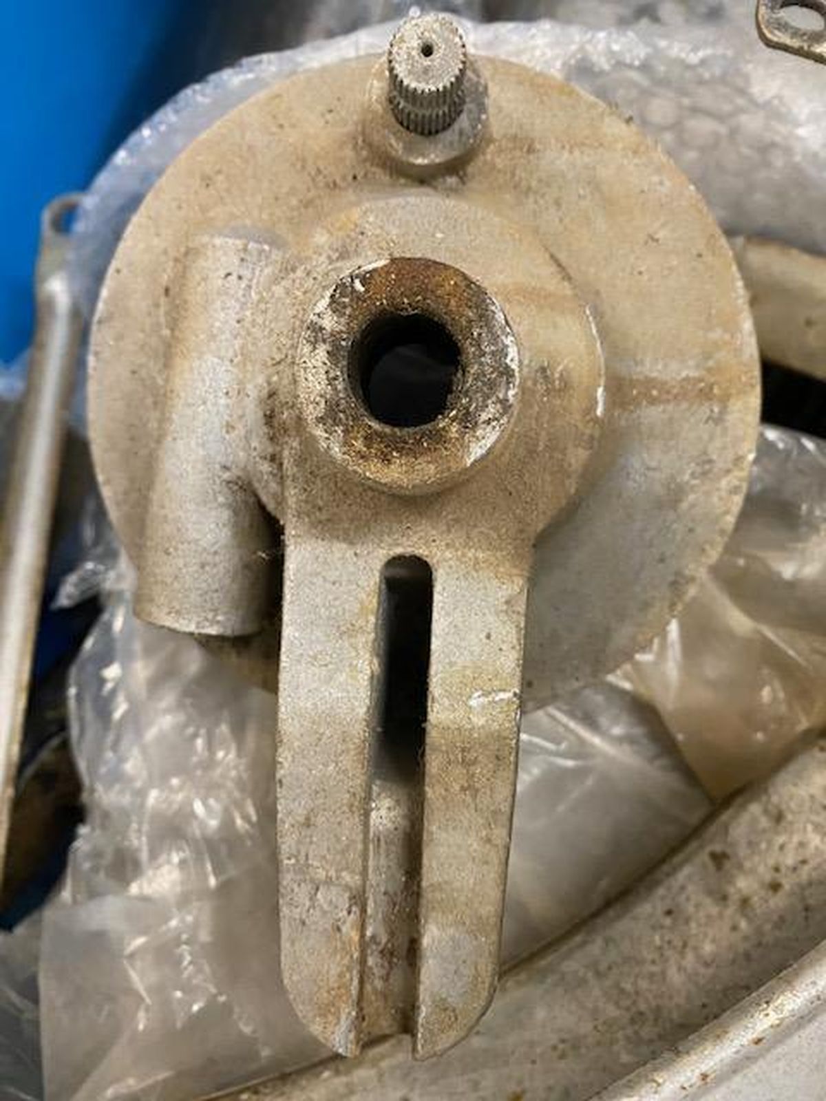 A close up of a piece of metal with a hole in it.