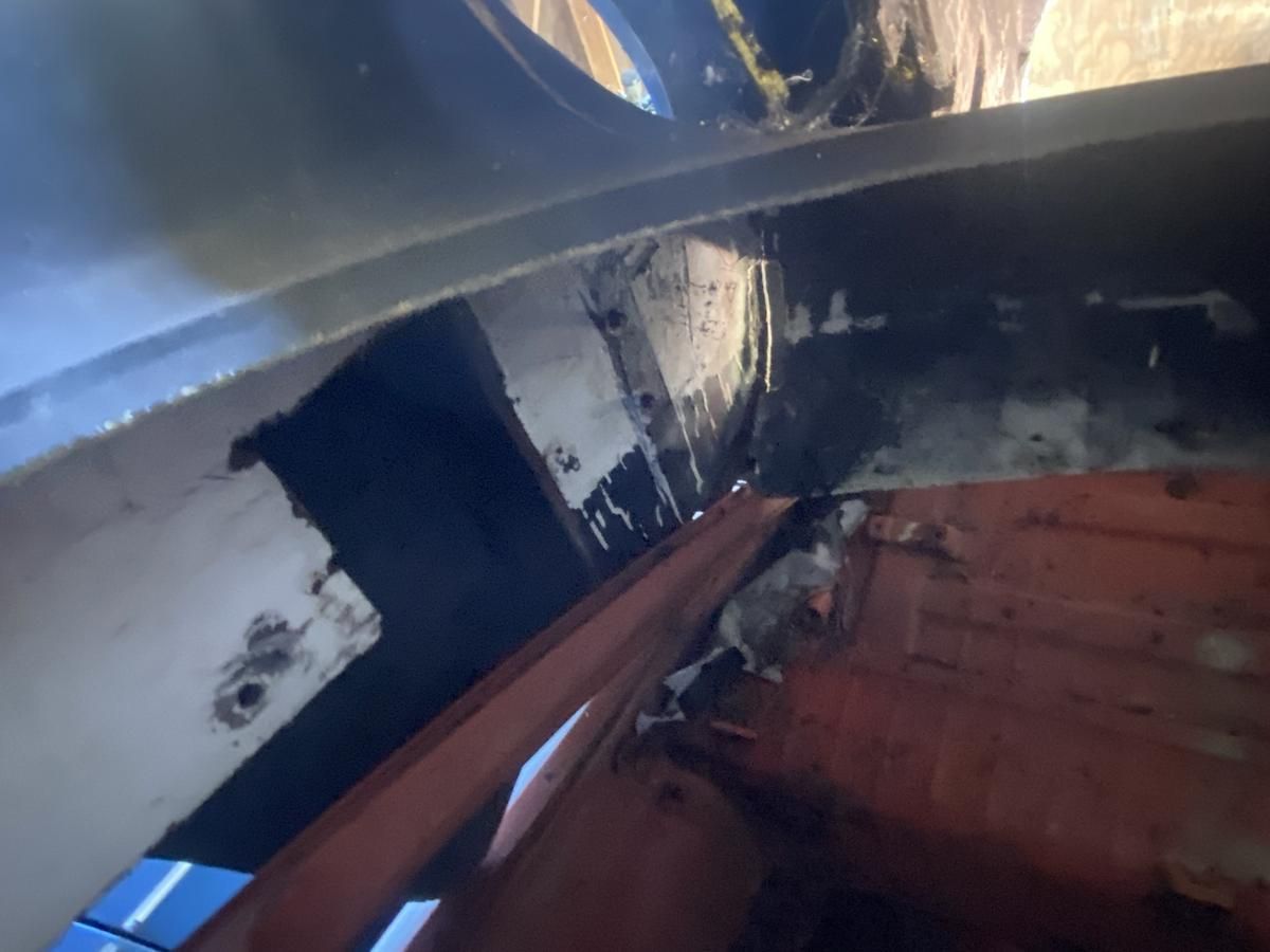 A close up of a piece of metal with a hole in it