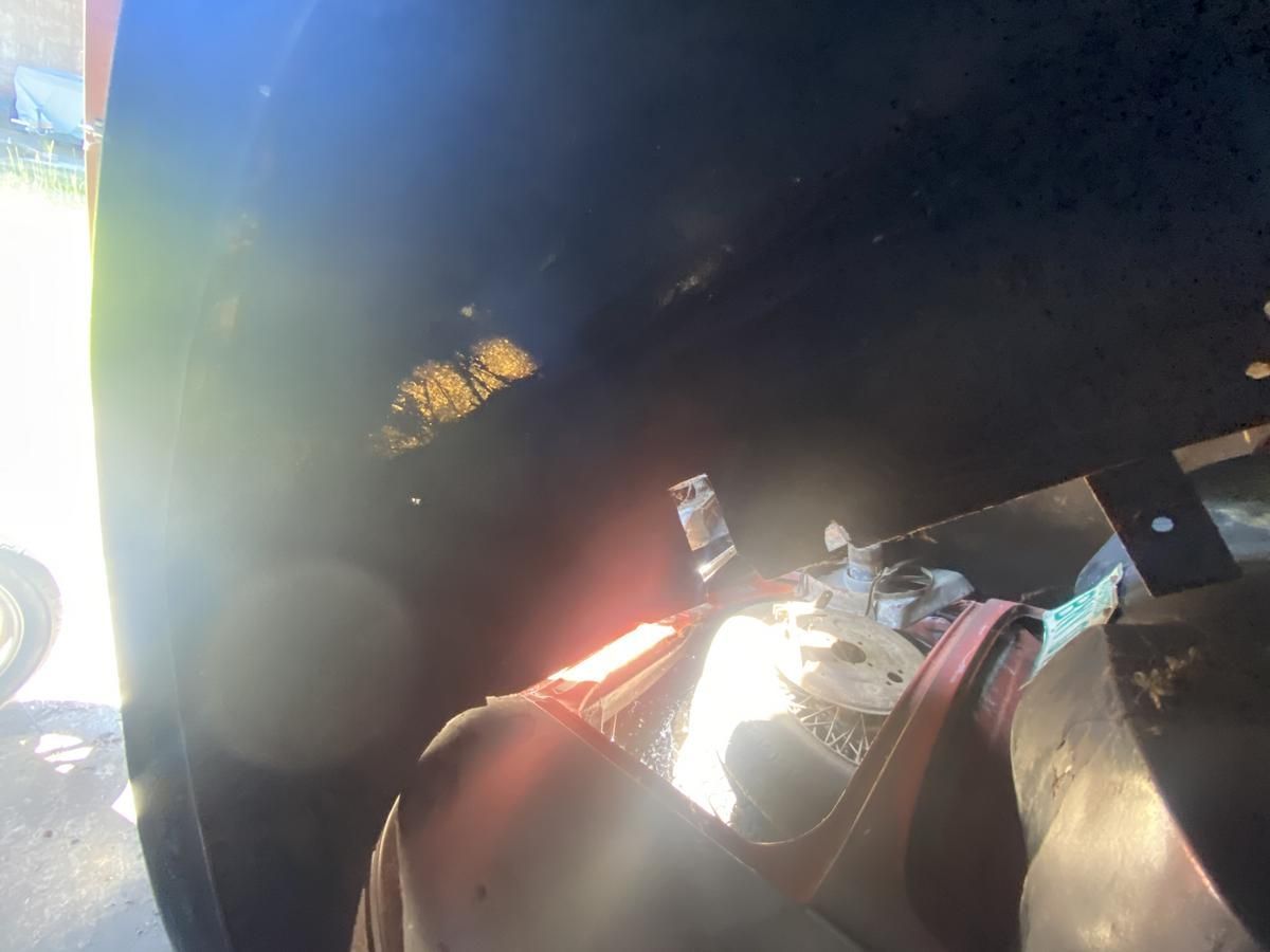 A close up of a person 's feet in a dark room