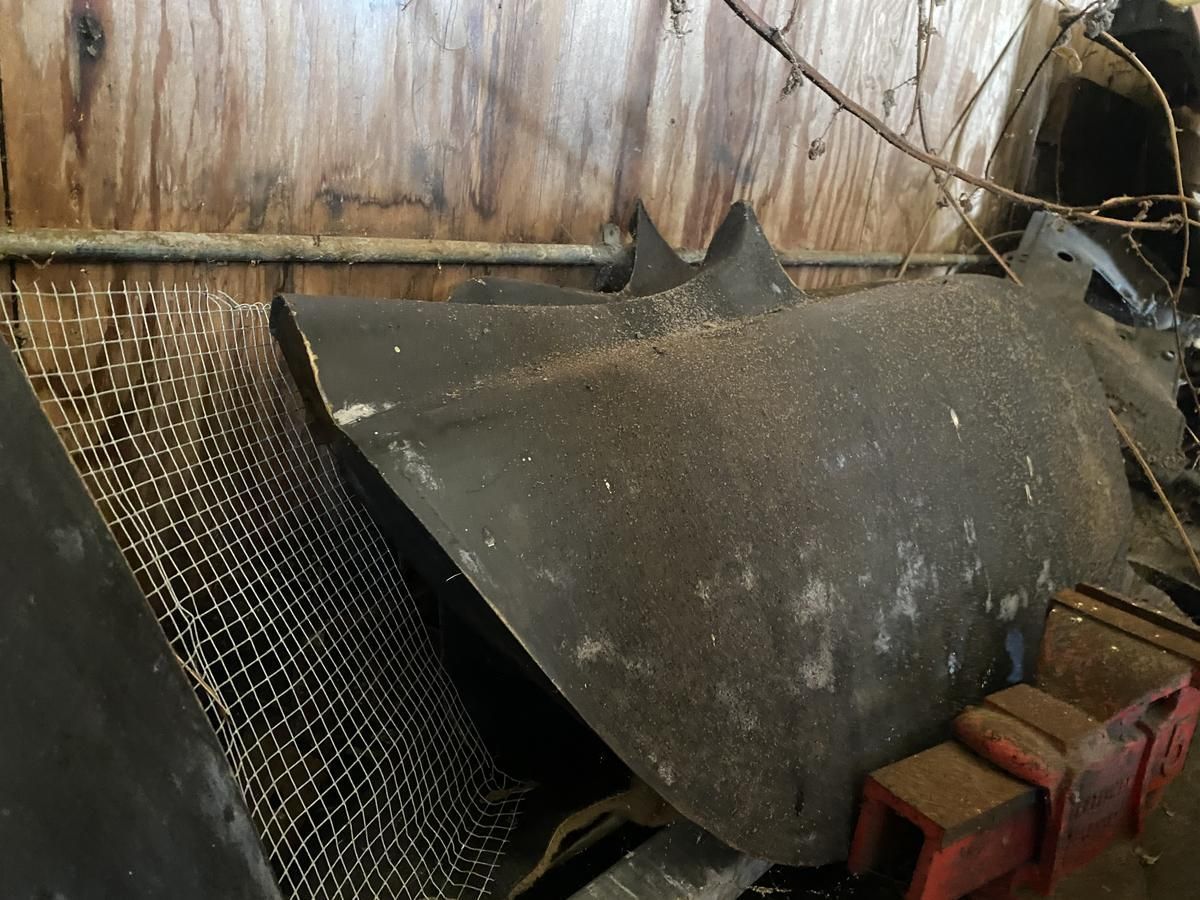 A bunch of pieces of metal are sitting on top of each other
