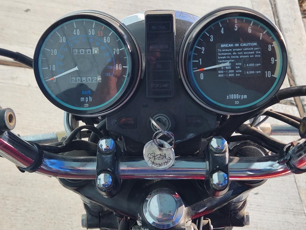 A close up of the dashboard of a motorcycle