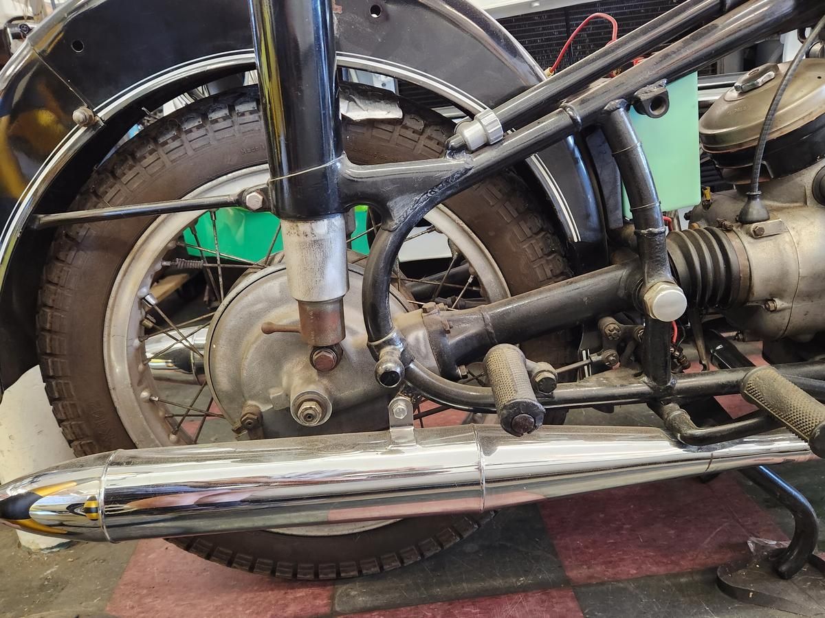 A close up of the rear end of a motorcycle.