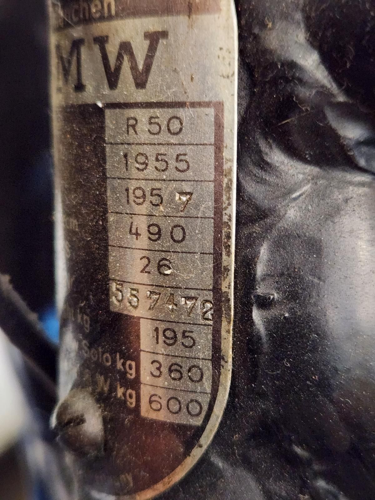 A close up of a label that says mw on it