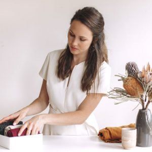 Sally Flower from Home Sanctuary folding clothes