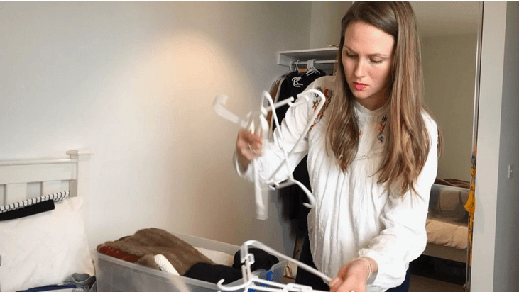 Sally Flower sorting out coat hangers