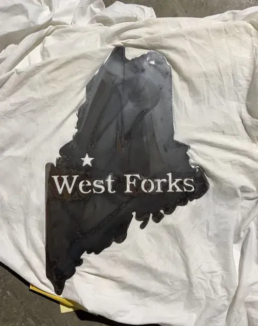 A t-shirt with a map of west forks on it