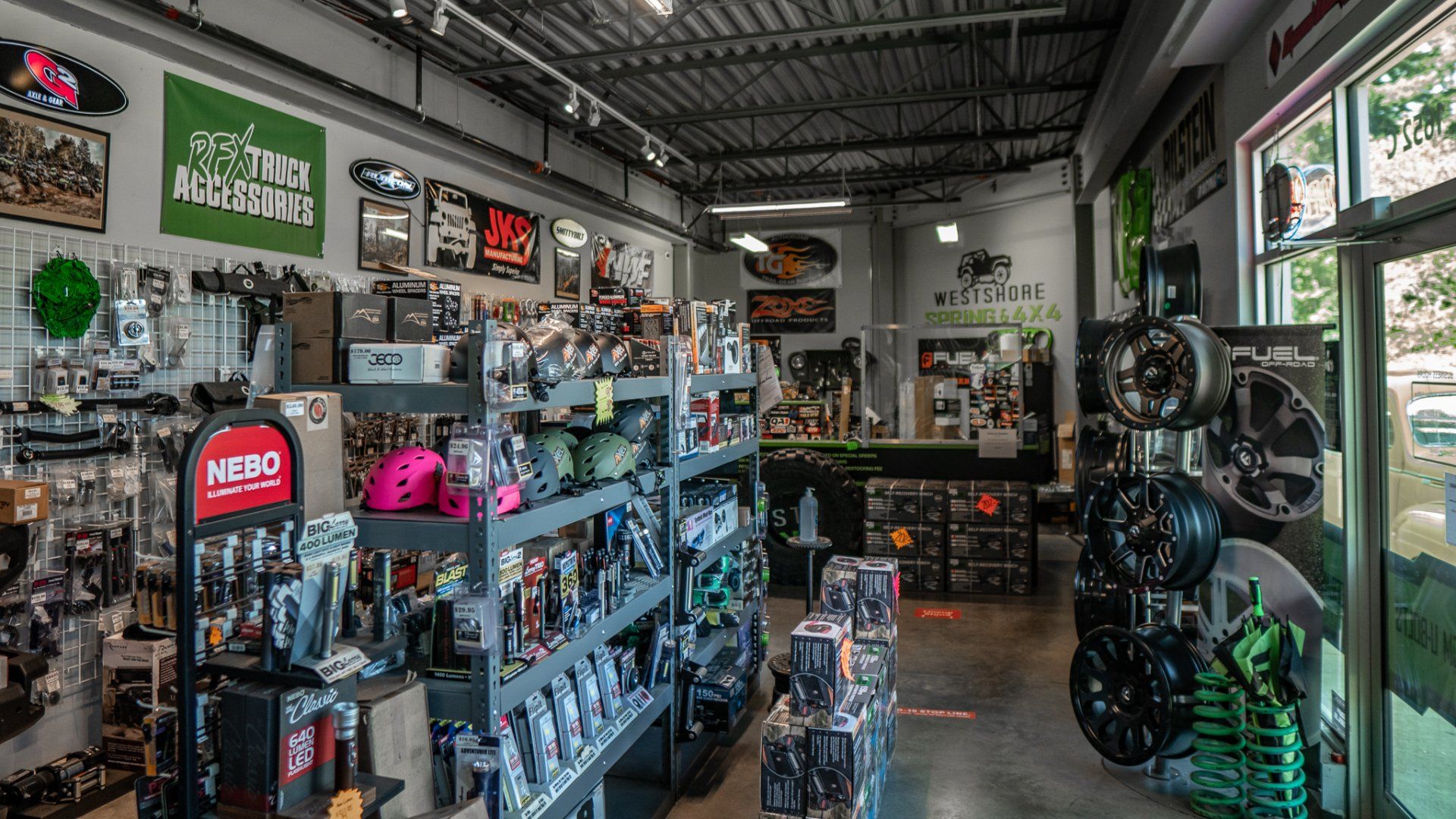 Inside a retail store, various products for sale are on display.