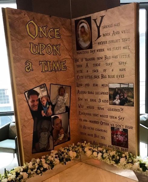 A book is open to a page that says once upon a time