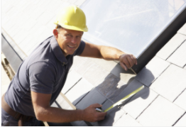 Cheyenne Roofing worker installing shingles on residential home in Cheyenne
