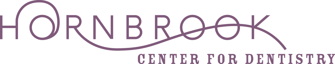 The hornbrook center for dentistry logo is purple and white.