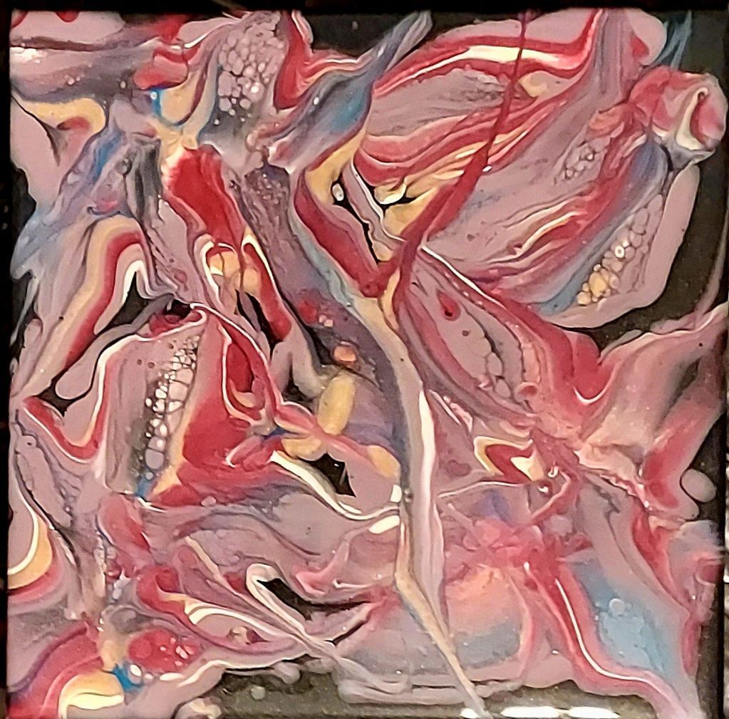 A close up of a painting with a lot of different colors