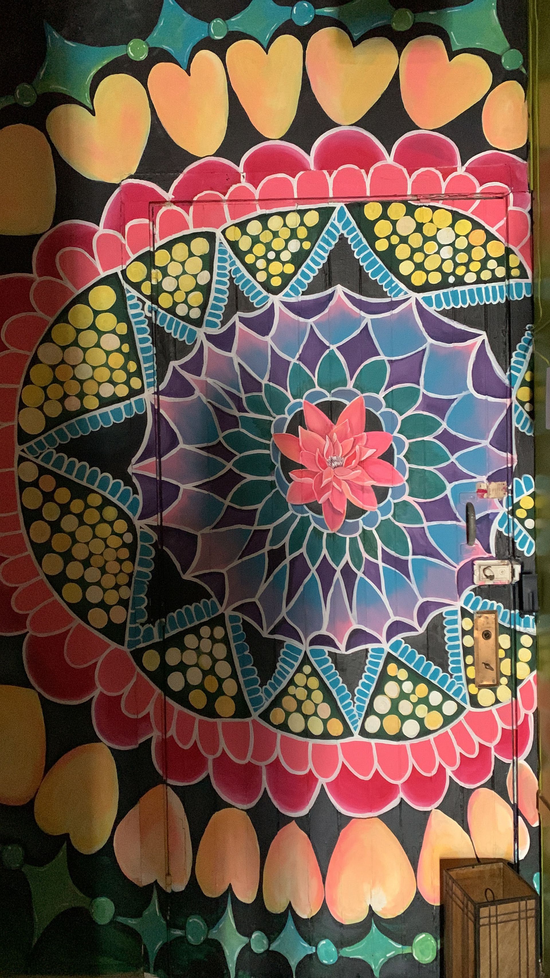 A door with a colorful painting on it
