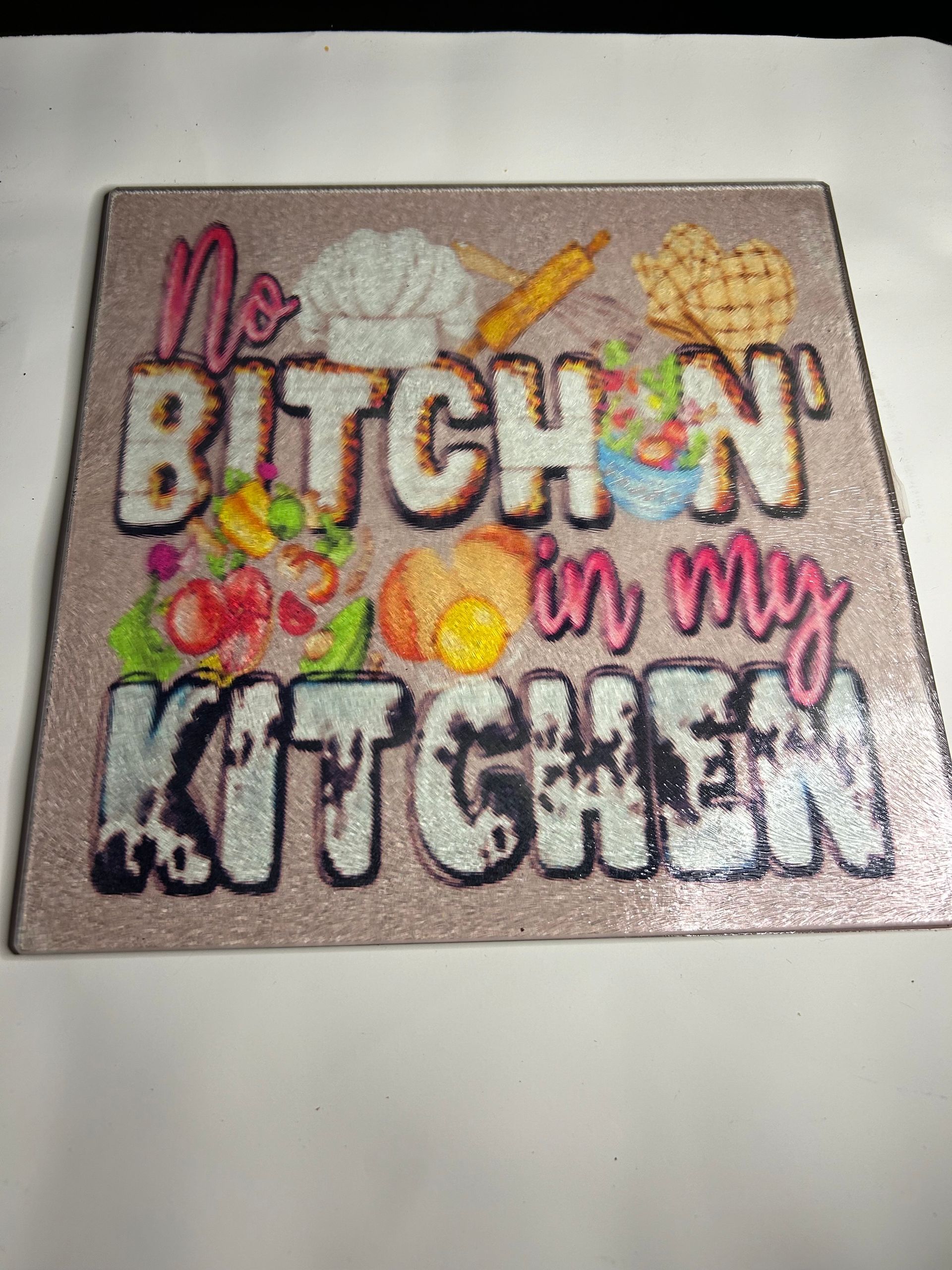a cutting board with the words 