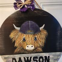 A painting of a highland cow wearing a purple hat.