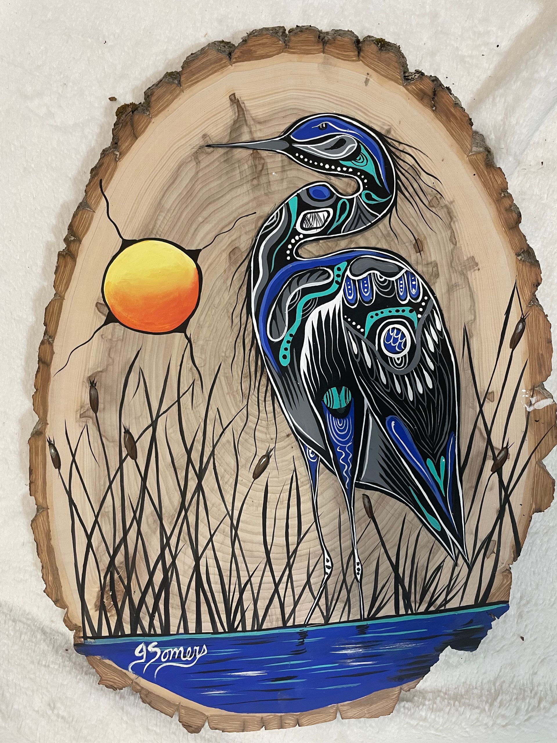 A native american painting of a stork on a piece of wood by Jessica Somers