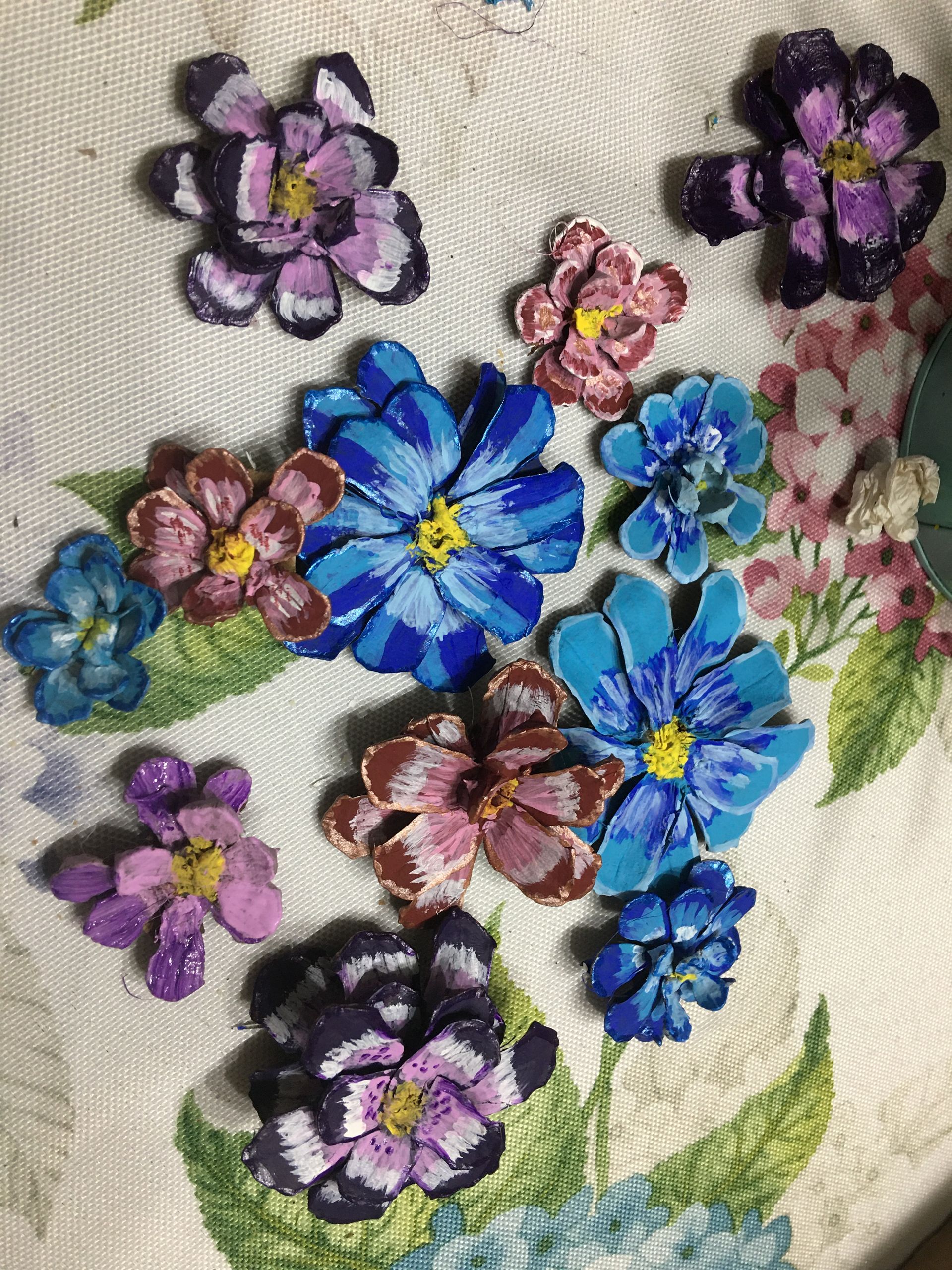 A bunch of flowers are sitting on top of a table.