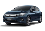 Um Honda City sedan azul escuro estacionado contra um fundo branco liso.