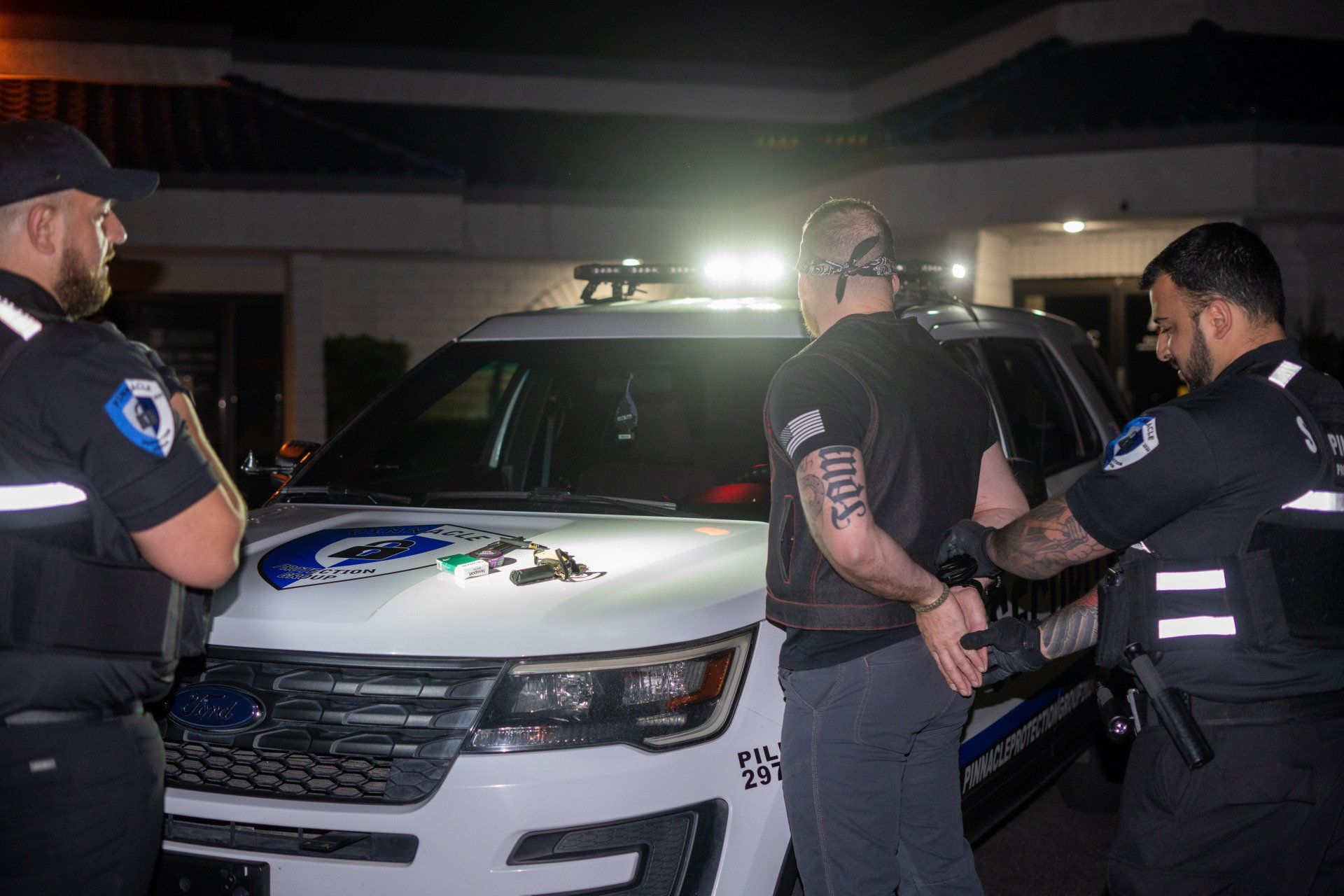 three security response team standing in the road