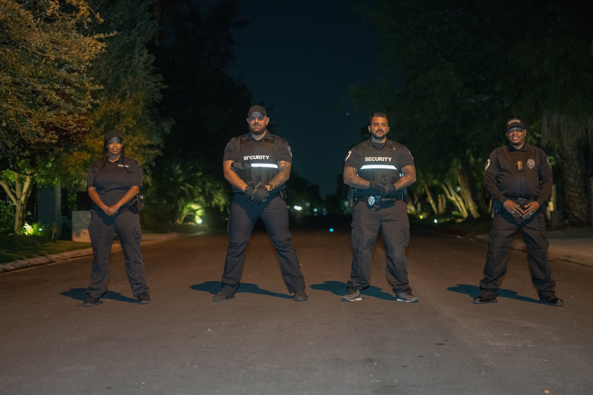 three security response team standing in the road