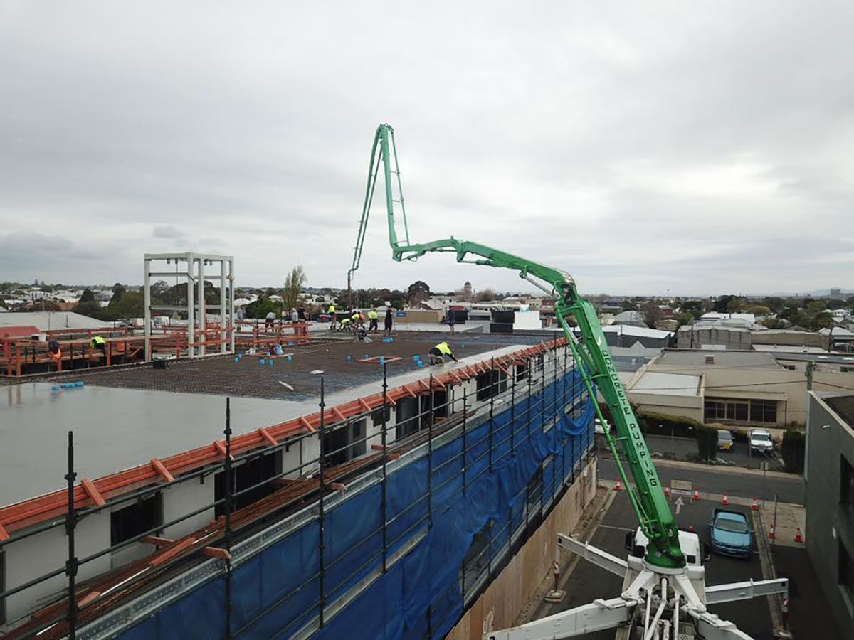 An aerial view of a construction site with a lot of machinery.