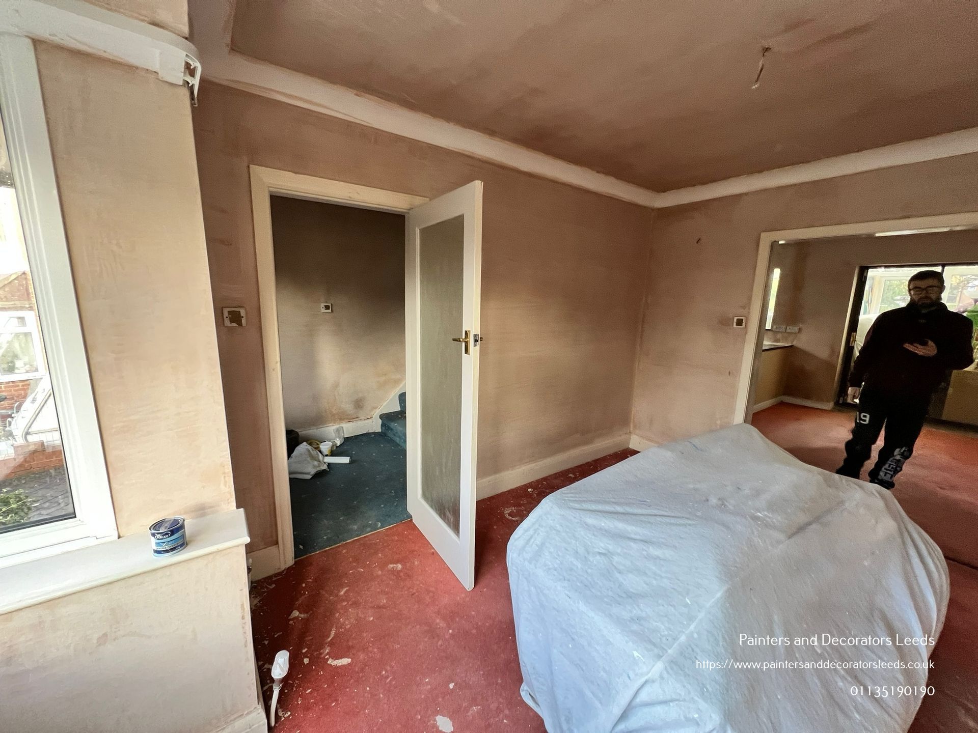 picture of a newly plastered living room by painters and decorators Leeds
