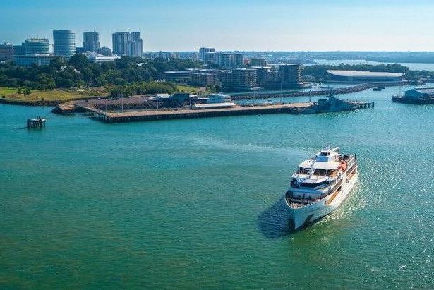 A Luxury Yacht Navigates Through Turquoise Waters — NT Driver Guide - Escorted Touring & Transfers in Darwin City, NT