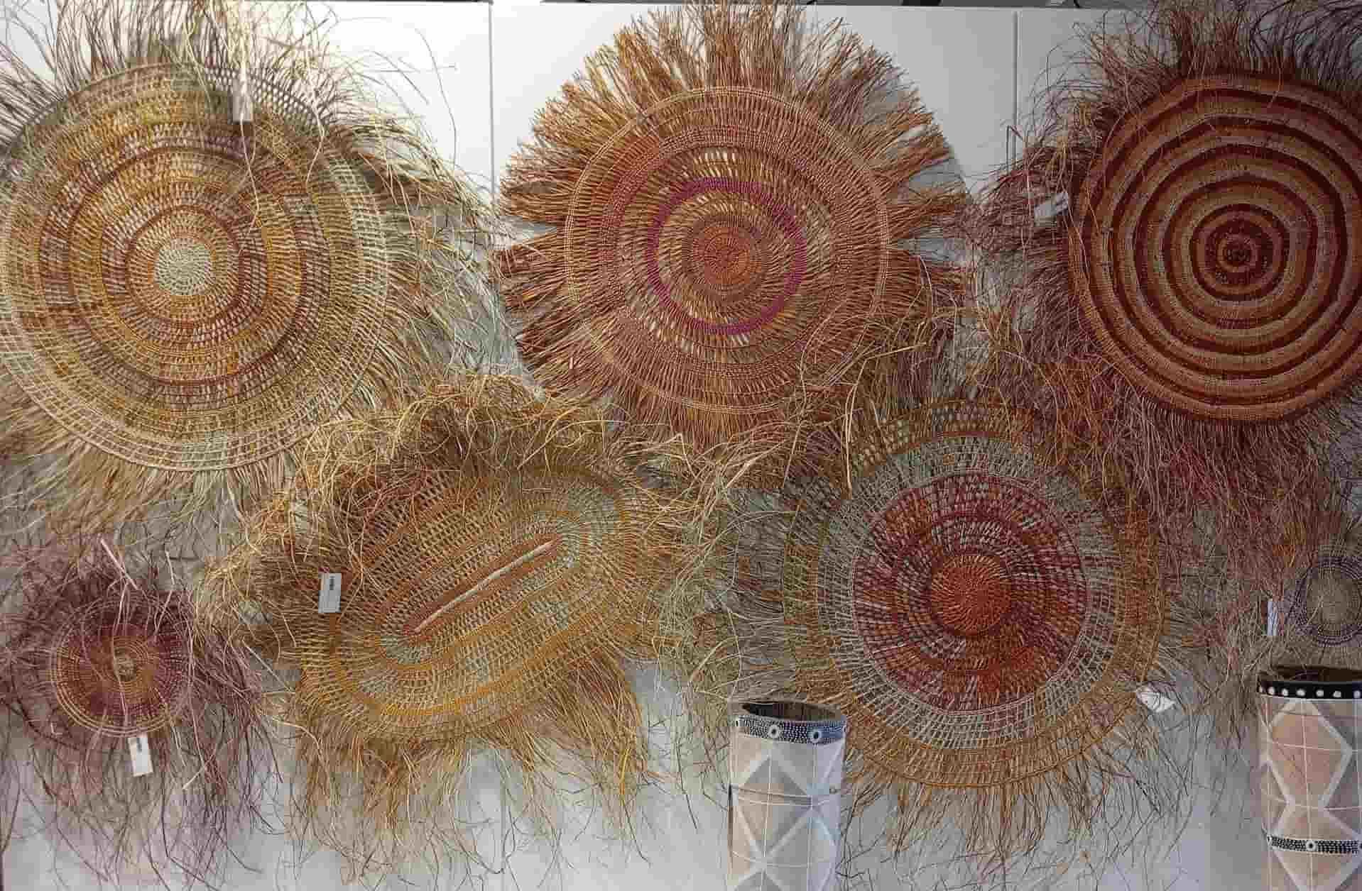 A Collection of Intricately Woven Circular Baskets With Natural Fibers — NT Driver Guide - Escorted Touring & Transfers in Darwin City, NT