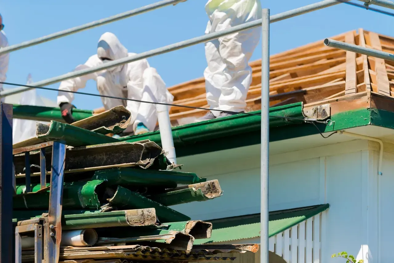 Workers installing roof and gutters | Brisbane, QLD | Skyes Roofing