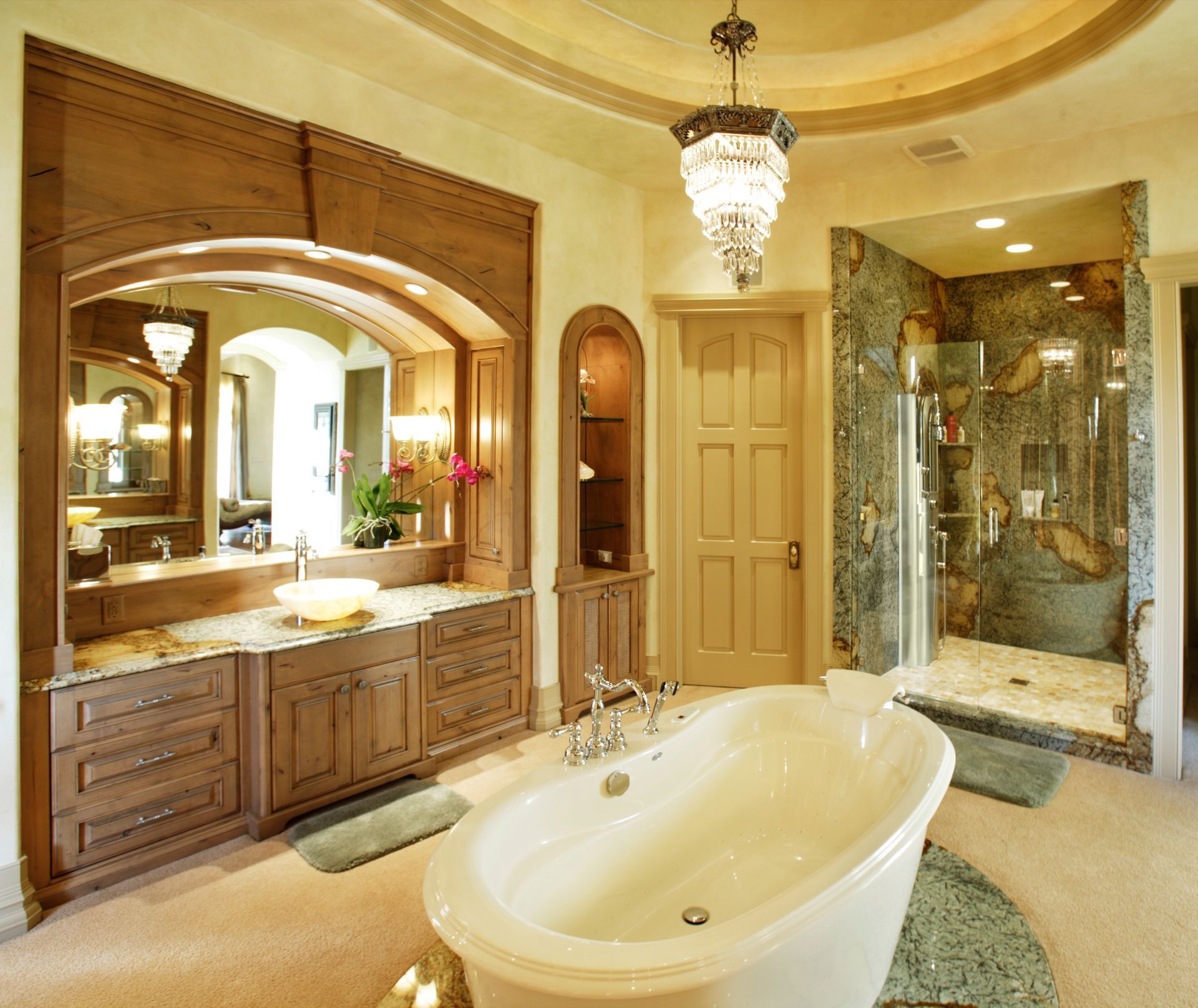 A bathroom with a bathtub and two sinks