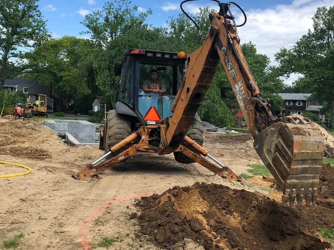 drainage site evaluation and water flow analysis in melville ny