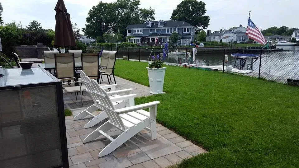 lawn overseeding and renovation process in melville ny