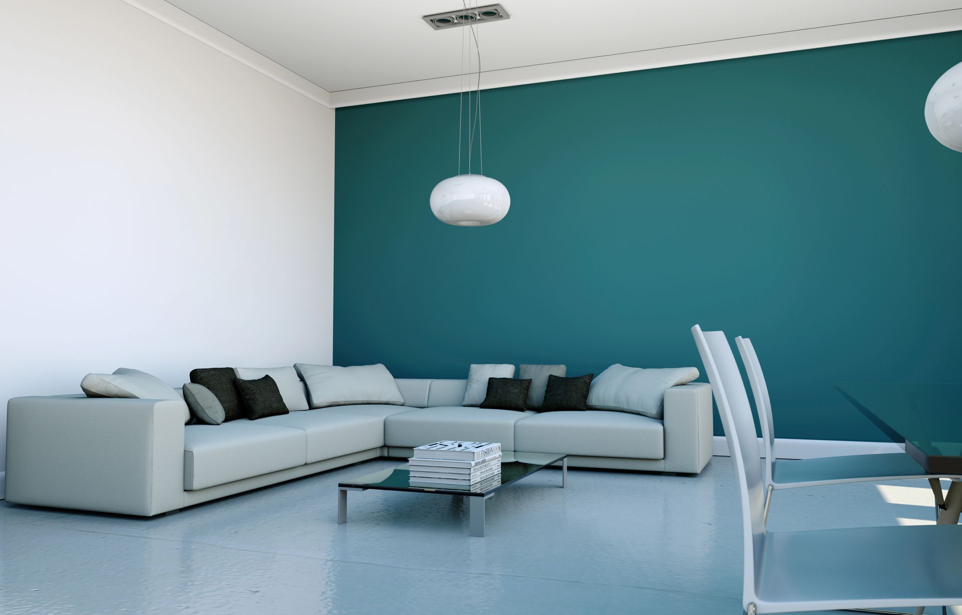 A living room with a white sectional couch and a blue wall