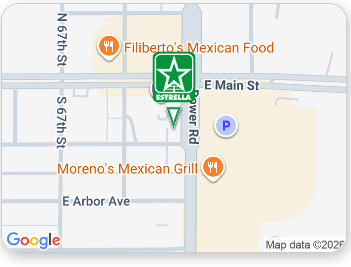 Map showing a green star marker near E Main St and restaurants in a downtown area.