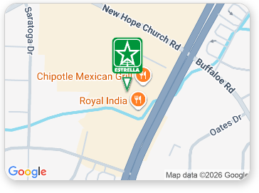 Map showing a green hotel icon near Chipotle Mexican Grill and Royal India by New Hope Church Rd