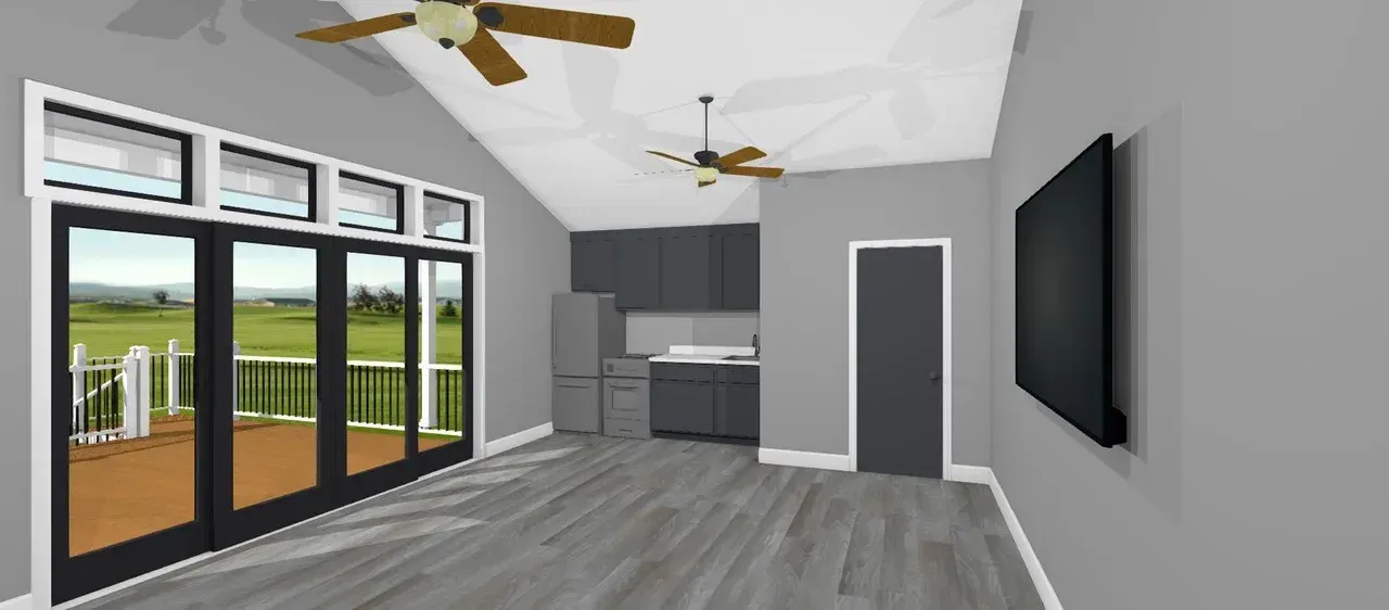 Modern open-plan living room with gray walls, wood floors, large sliding glass doors, and a kitchen area.