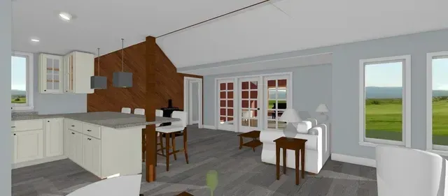 Bright open kitchen and dining area with white cabinets, wood accents, and large windows overlooking a green landscape