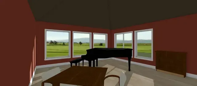 Modern room with a grand piano, wooden table, red walls, and large windows overlooking a green field